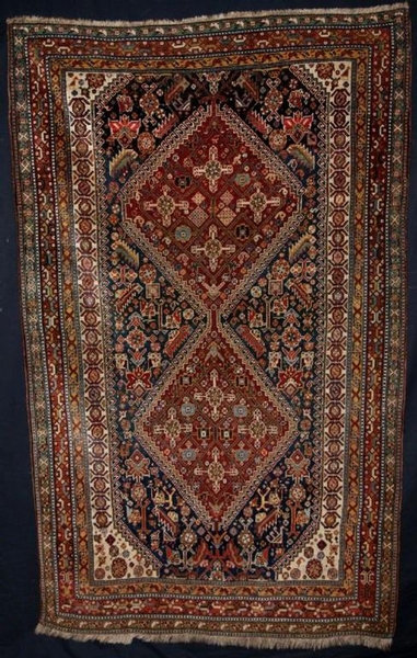 ANTIQUE SOUTH WEST PERSIAN QASHQAI RUG, TWO MEDALLIONS, CIRCA 1900. 