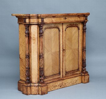 Antique 19th Century birds eye maple cabinet