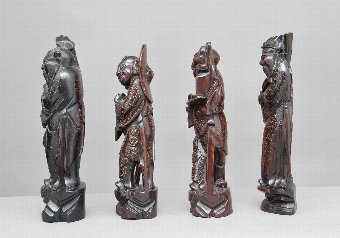 Antique A set of four 19th Century root carvings 