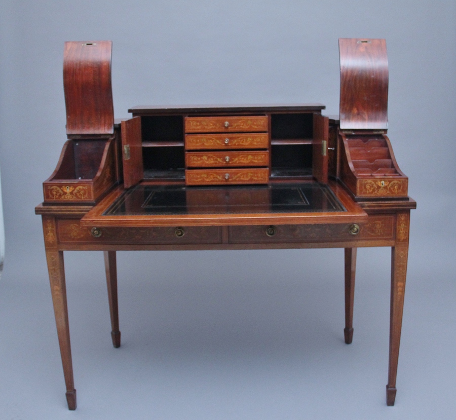 Antique Fabulous quality early 20th Century mahogany and inlaid Carlton house desk