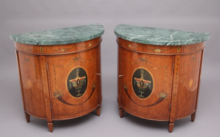 Antique Pair of early 20th Century satinwood and painted demi lune cabinets 