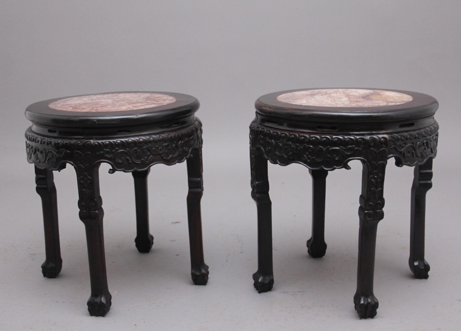 Antique A pair of 19th Century Chinese carved hardwood occasional tables