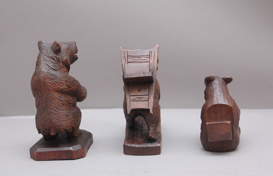 Antique A set of three 19th Century black forest carvings of bears in different poses