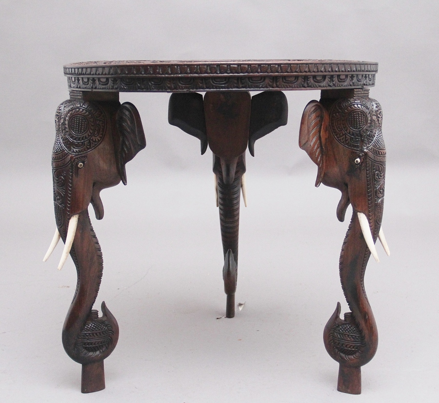 Antique A superb quality 19th Century Anglo-Indian carved elephant occasional table