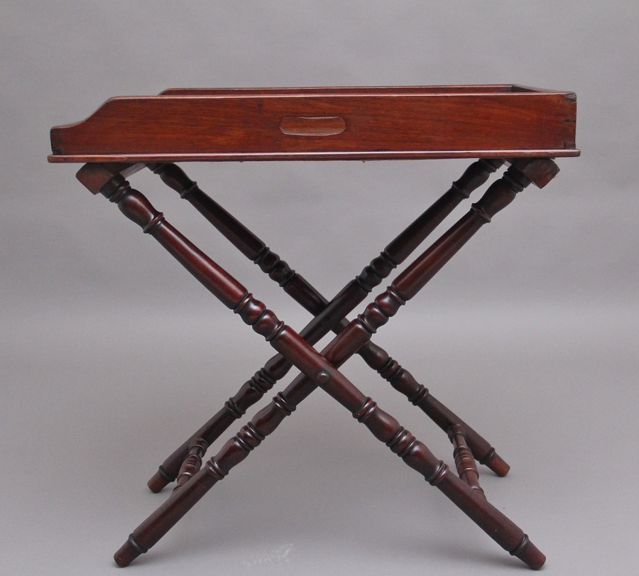 Antique A lovely quality early 19th Century mahogany butlers tray on stand