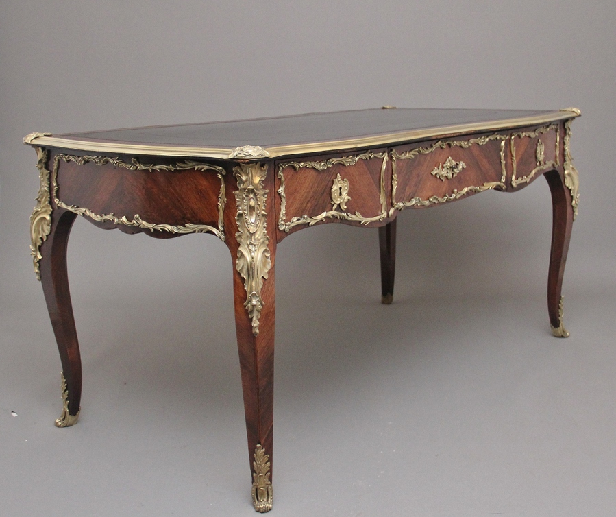 Antique A superb quality 19th Century French Kingwood and ormolu mounted bureau-plat desk
