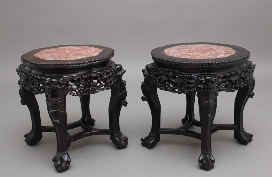 A pair of 19th Century antique Chinese carved hardwood occasional table