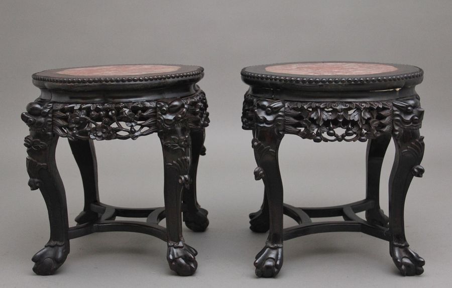 Antique A pair of 19th Century antique Chinese carved hardwood occasional table