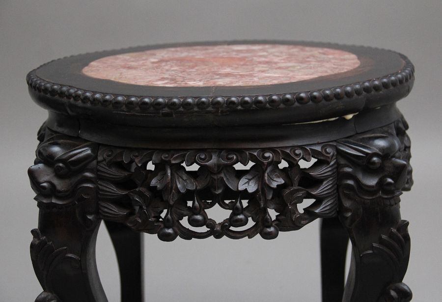 Antique A pair of 19th Century antique Chinese carved hardwood occasional table