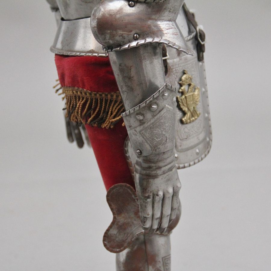 Antique An impressive early 20th miniature suit of armour