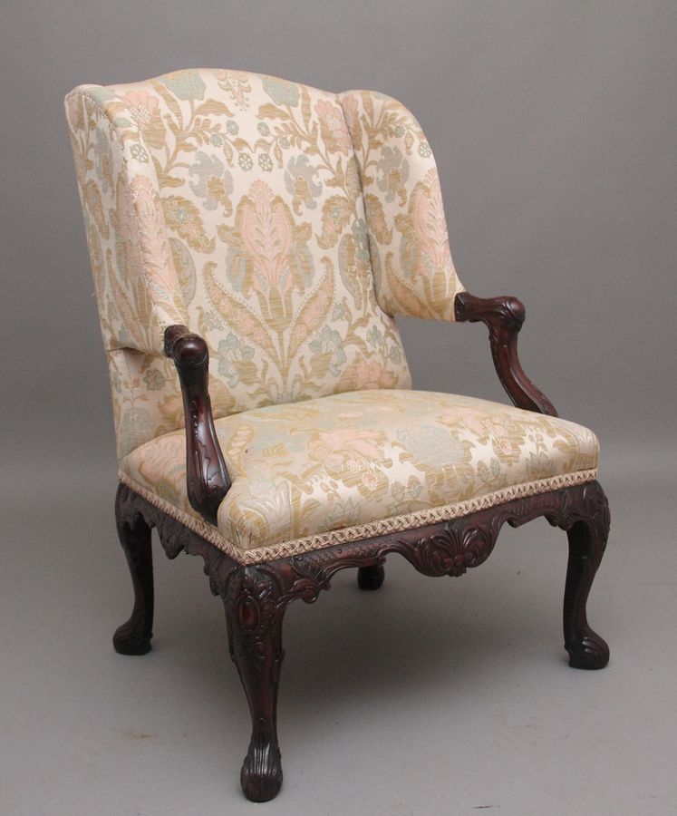 19th Century carved mahogany library armchair in the Chippendale style