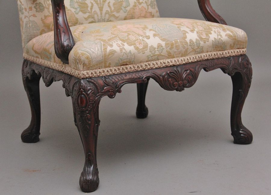 Antique 19th Century carved mahogany library armchair in the Chippendale style