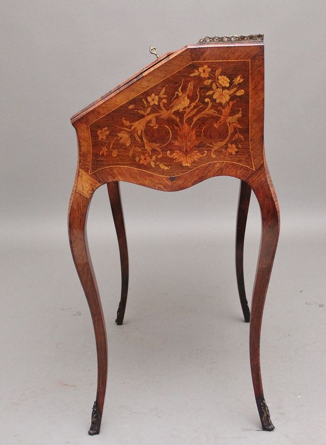 Antique A superb quality freestanding 19th Century Kingwood and marquetry inlaid bureau