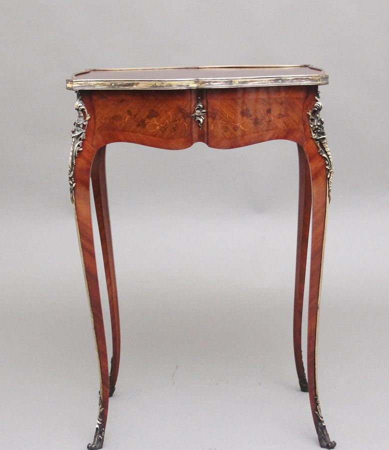 A freestanding 19th Century French Kingwood and marquetry side table