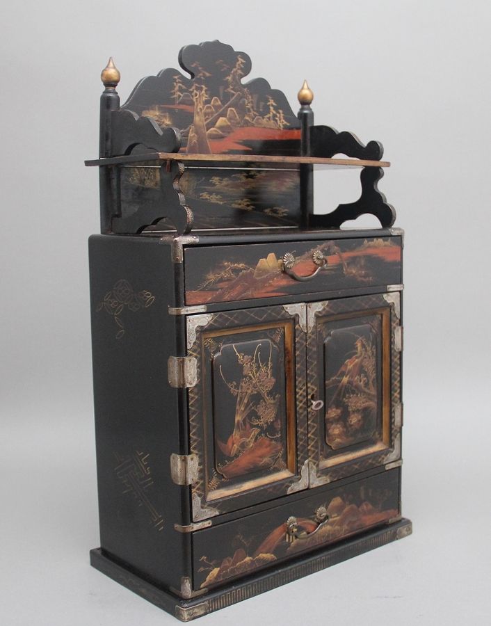 19th Century black lacquered and painted table cabinet