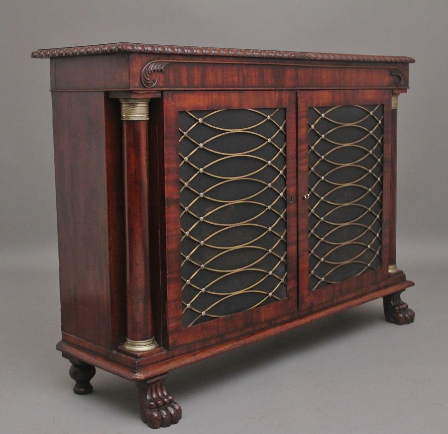 Antique A fabulous quality early 19th Century mahogany side cabinet