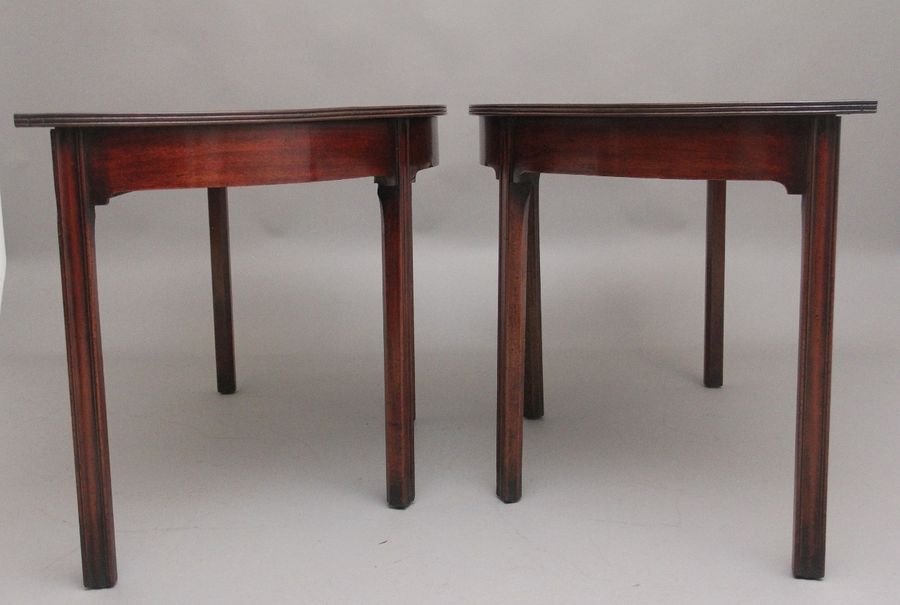 Antique A fine pair of early 19th Century mahogany demi-lune console tables