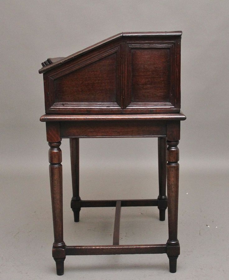 Antique 18th Century oak desk on later stand