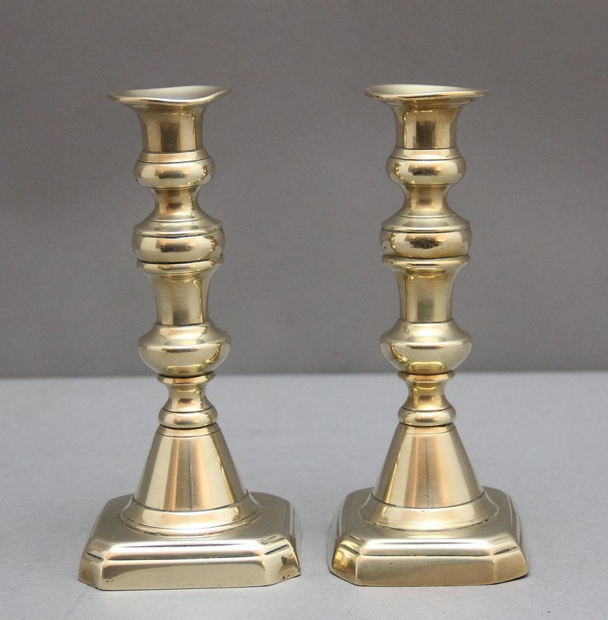 Antique A pair of 19th Century brass candlesticks