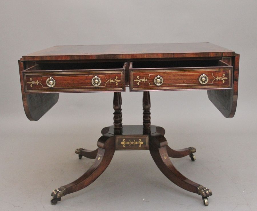 Antique Regency rosewood and brass inlaid sofa table