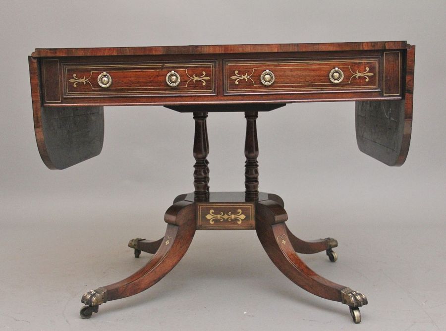 Antique Regency rosewood and brass inlaid sofa table