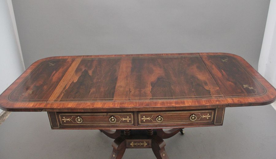 Antique Regency rosewood and brass inlaid sofa table