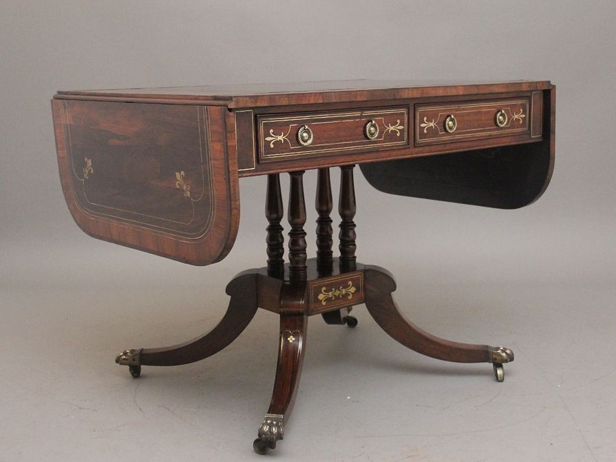 Antique Regency rosewood and brass inlaid sofa table