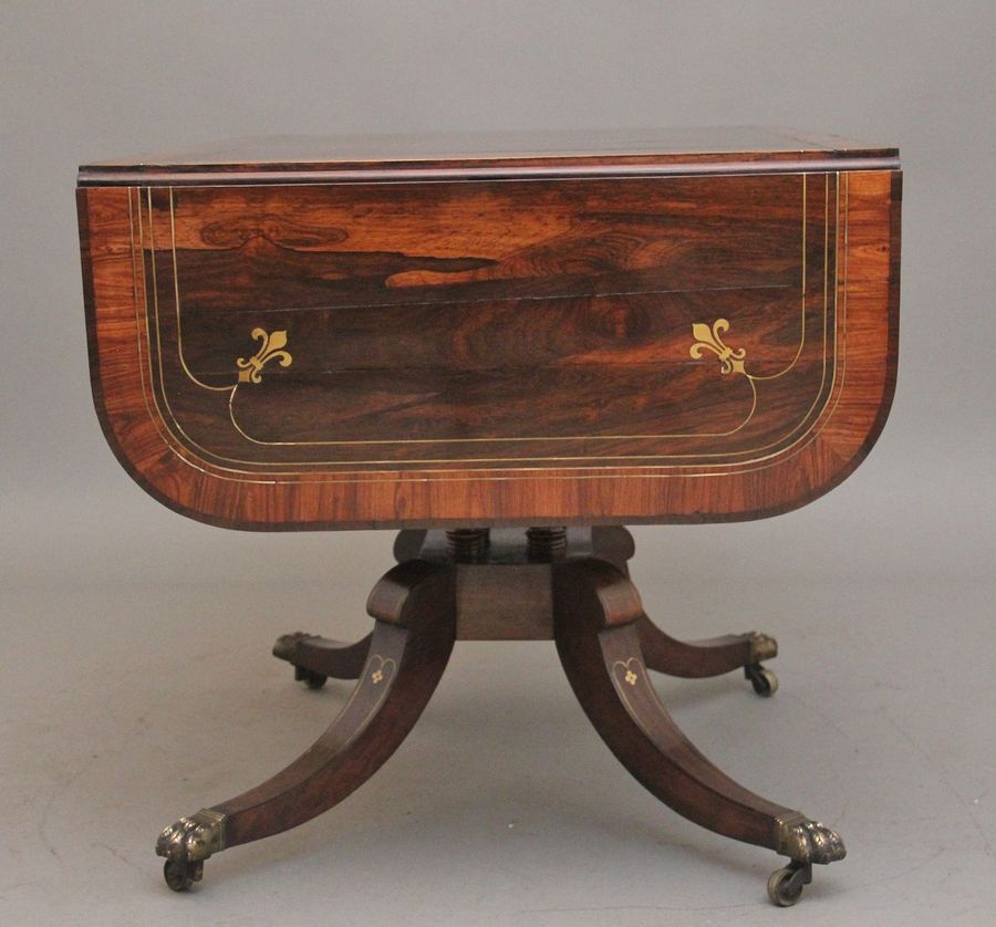 Antique Regency rosewood and brass inlaid sofa table