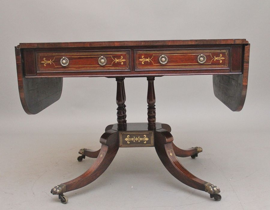 Antique Regency rosewood and brass inlaid sofa table