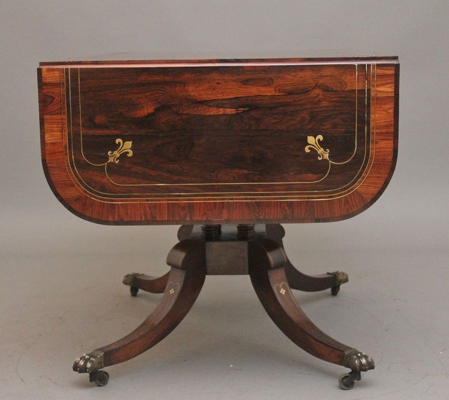 Antique Regency rosewood and brass inlaid sofa table