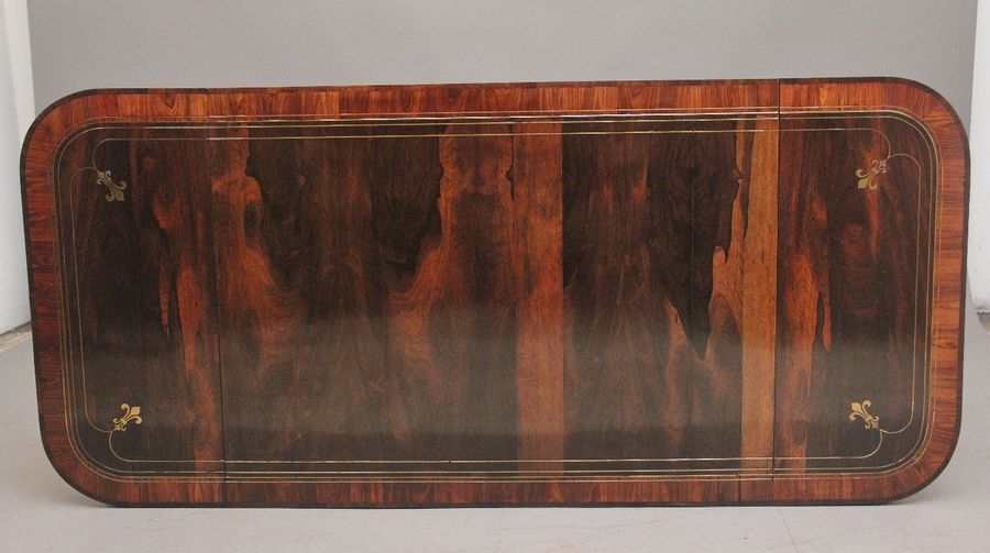 Antique Regency rosewood and brass inlaid sofa table