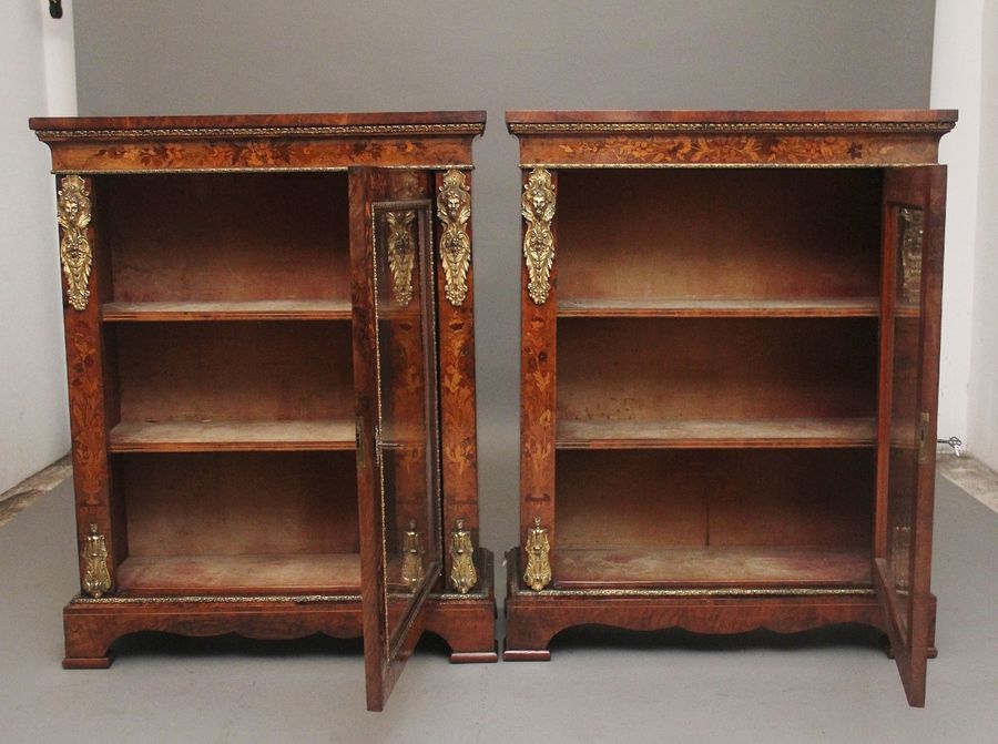 Antique Pair of 19th Century walnut pier cabinets by Edwards & Roberts