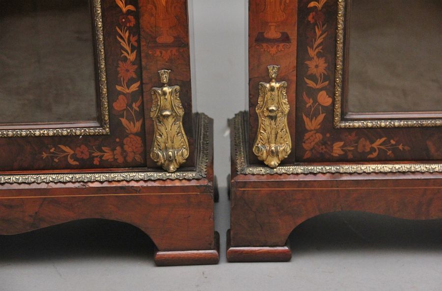 Antique Pair of 19th Century walnut pier cabinets by Edwards & Roberts