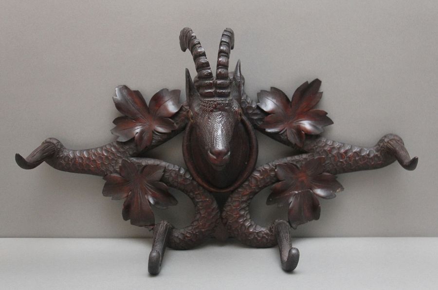 Antique 19th Century black forest carved coat rack