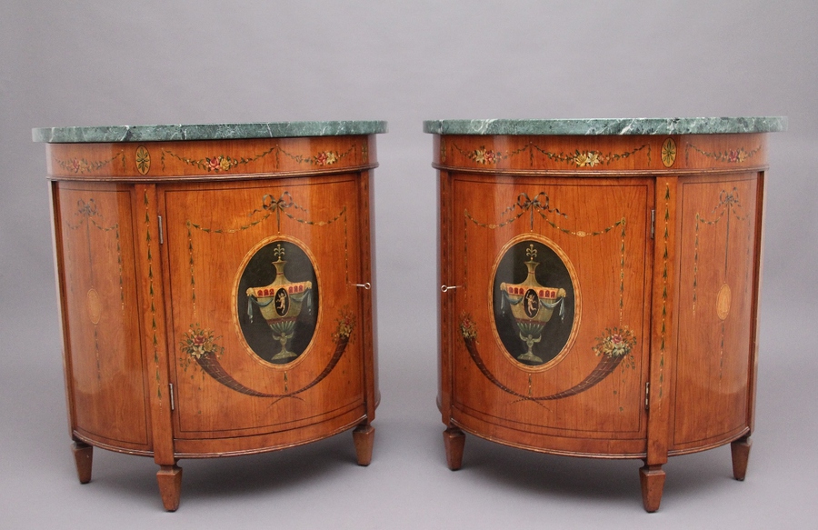 Antique Pair of early 20th Century satinwood and painted demi lune cabinets 