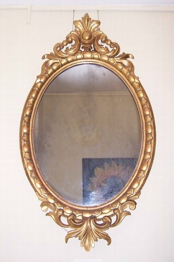 Carved Giltwood Oval Mirror 19th Century