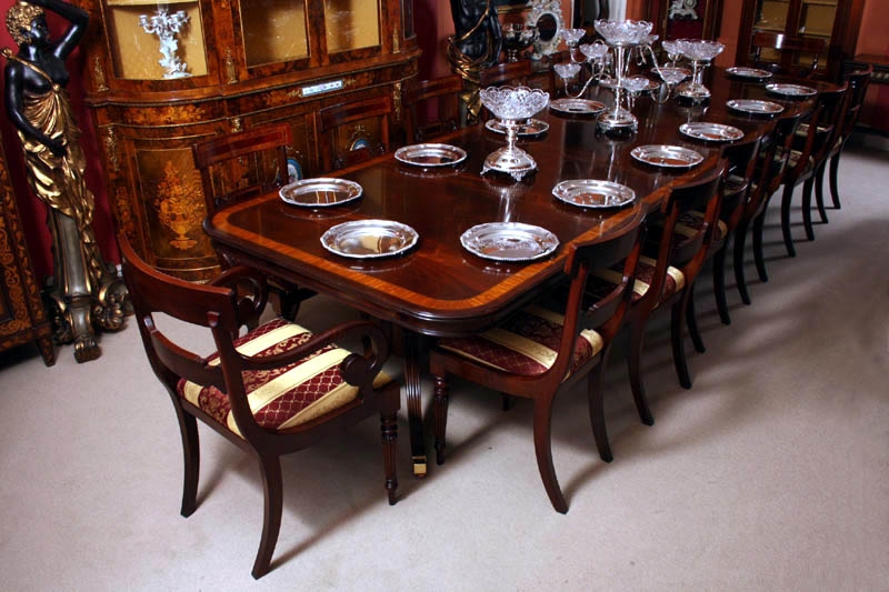 14 ft Three Pillar mahogany dining table and 14 chairs