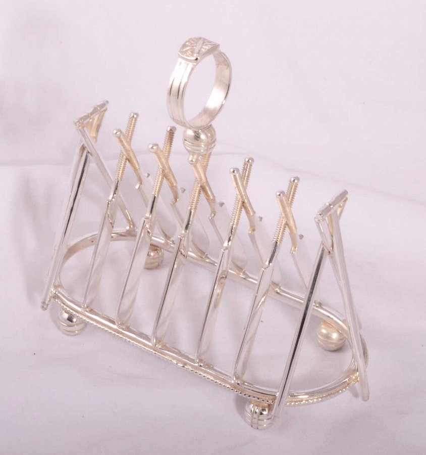 Beautiful silver plated toast rack crossed cricket bats