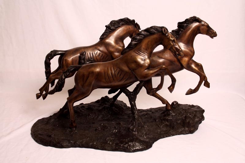Stunning Bronze Sculpture of Three Galloping Horses