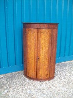 George 111.Oak Bow Fronted Corner Cupboard.