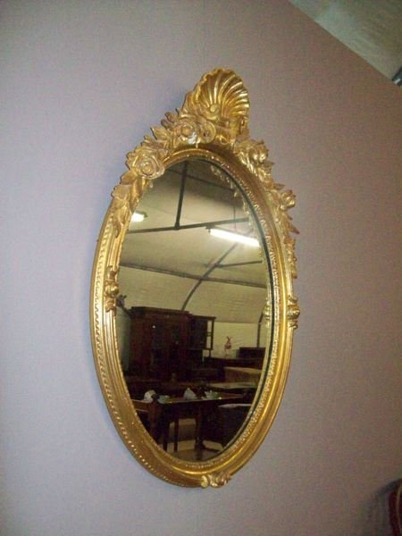 Early 20th.Century Oval Giltwood Mirror