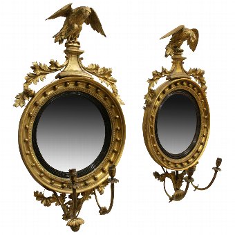 A Pair of Regency Giltwood Convex Mirrors