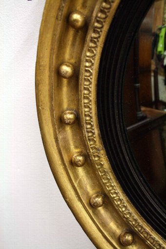 Antique A Pair of Regency Giltwood Convex Mirrors