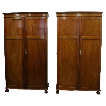 Pair of Georgian Style Bow Fronted Mahogany Wardrobes by Maple & Co