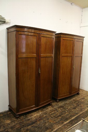 Antique Pair of Georgian Style Bow Fronted Mahogany Wardrobes by Maple & Co