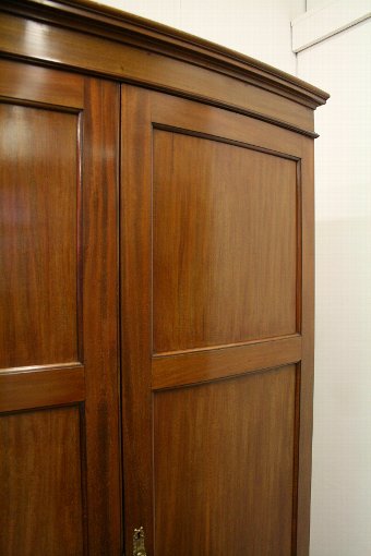 Antique Pair of Georgian Style Bow Fronted Mahogany Wardrobes by Maple & Co