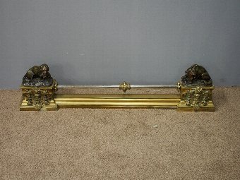Antique Brass and Steel Fender with Bronze Lion Mounts
