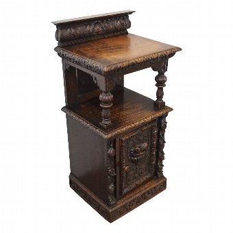 Neat Continental Carved Oak Cupboard