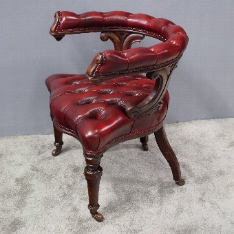 Oak and Burgundy Leather Horseshoe Captains Chair