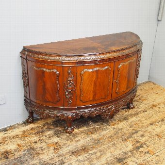 Carved Mahogany Bow Front Cabinet
